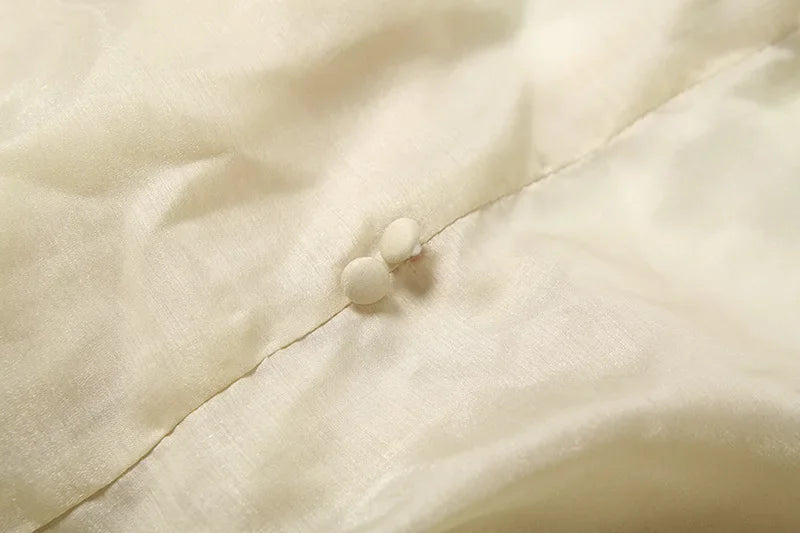 שמלת קוקטייל בבע שמנת